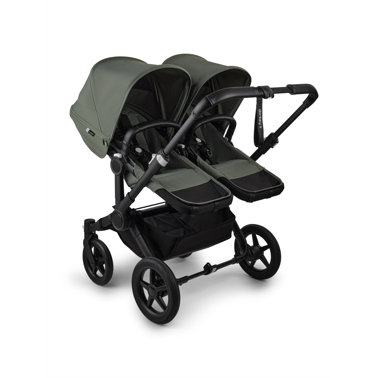 Framsidan av barnvagnen Bugaboo Donkey 5 Twin för tvillingar i skogsgrön med två sittdelar