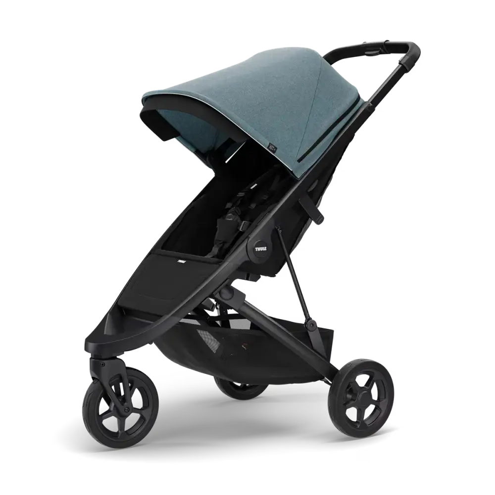 Barnvagnen Thule Spring med blรฅgrรถnmelerad sufflett och svart chassi